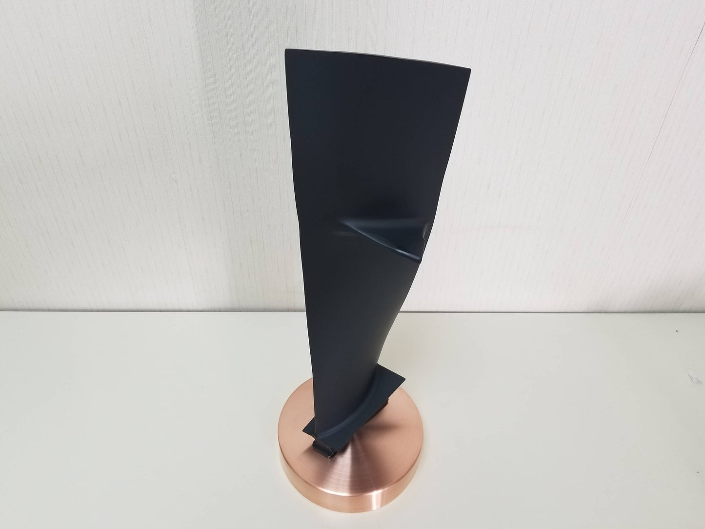 Carbon Black and Copper Pratt & Whitney JT8D stage 1 jet engine blade on a stand.
