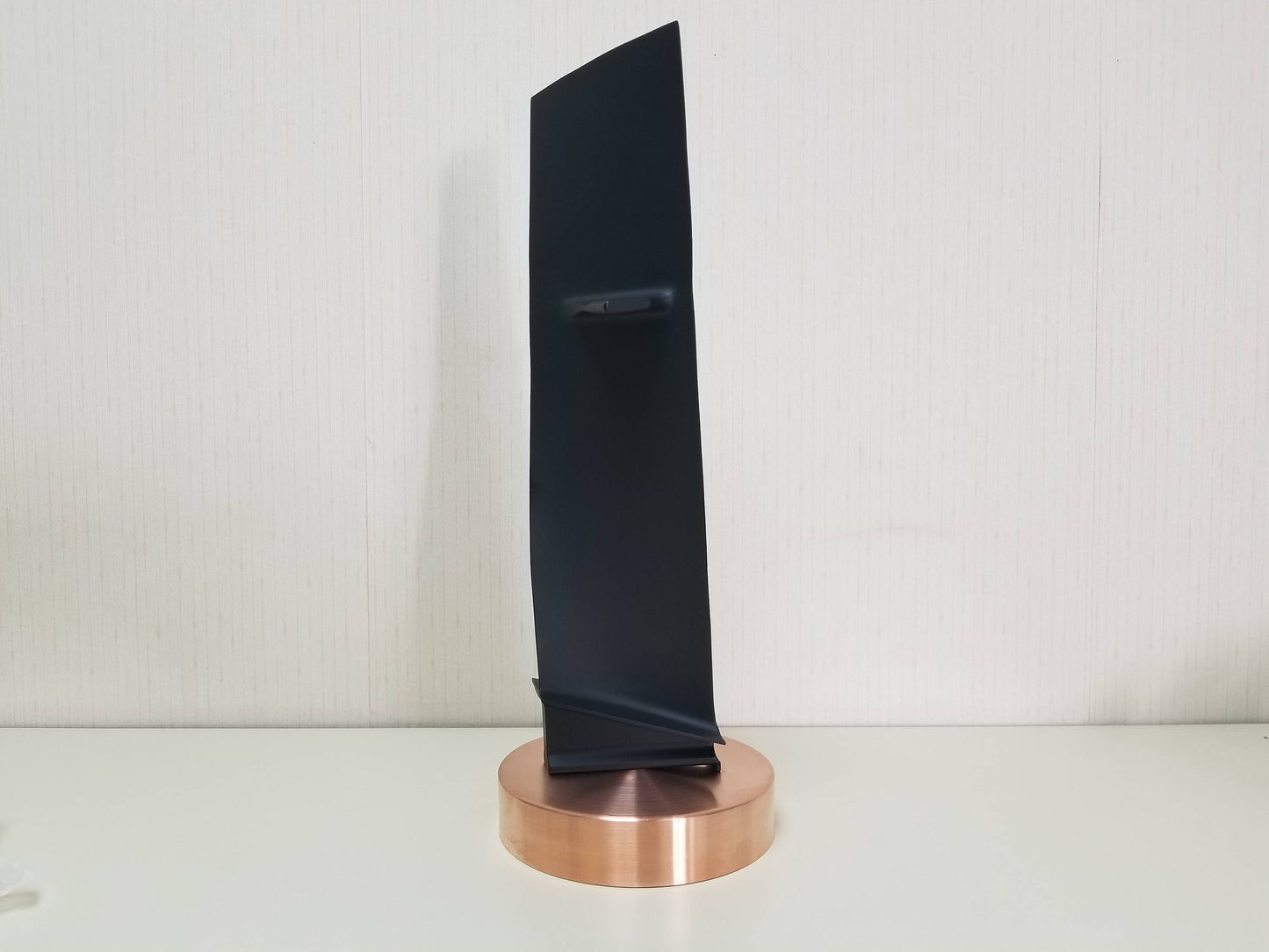 Carbon Black and Copper Pratt & Whitney JT8D stage 1 jet engine blade on a stand.